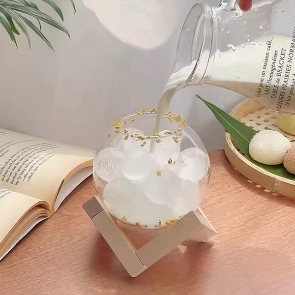 Sphere cup with wooden stand and straw